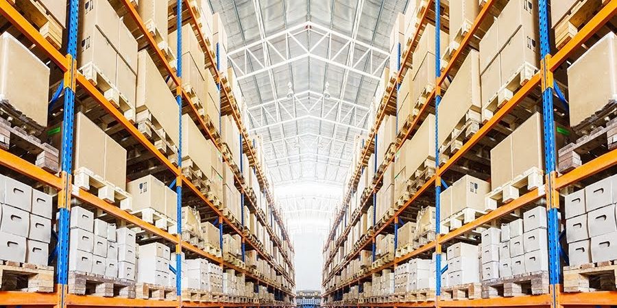 Rows of shelves with boxes in modern warehouse