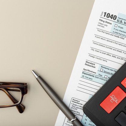 individual-tax-return-form-table-tax-time-concept-top-view-copy-space